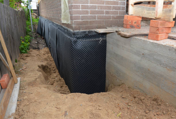 SJ Waterproofing Pros technician performing targeted Foundation Crack Repair assessment in Newtown Square, PA